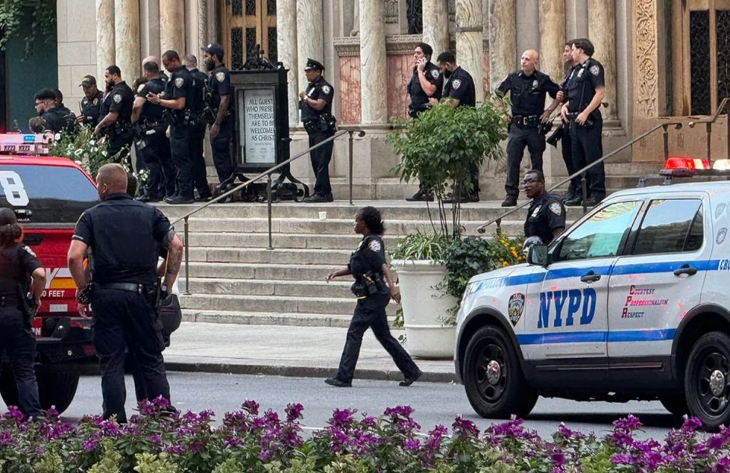 Police officer and civilian injured in midtown Manhattan shooting ...