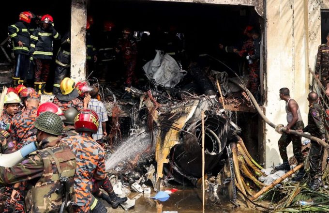 Many firefighters and first responders attending to the disaster caused by a plane crashing into a building