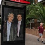 ChatGPT Plus The photo of Donald Trump and Jeffrey Epstein hugging and looking very affectionate on a bus stop poster