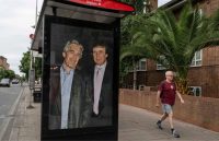 ChatGPT Plus The photo of Donald Trump and Jeffrey Epstein hugging and looking very affectionate on a bus stop poster