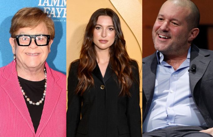 Eve Jobs, Elton John, and Jony Ive standing side by side in elegant suits
