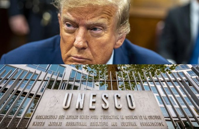 Donald Trump with a very serious expression, and below him, the large United Nations building with a mural that says "UNESCO" in front of it