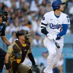 Shohei Ohtani in the batter’s box watching where the ball he just hit is headed