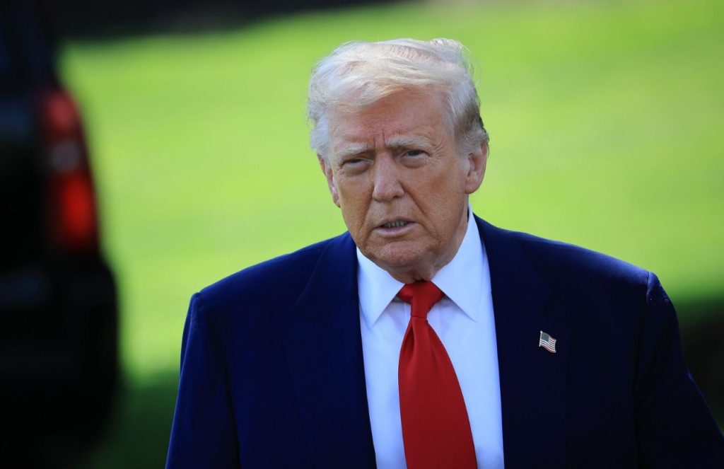 Donald Trump wearing an elegant blue suit
