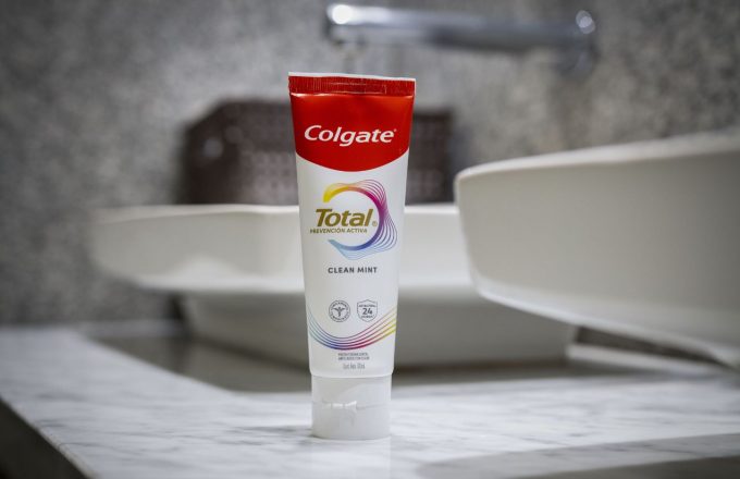 A Colgate product placed on a bathroom sink