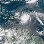 A satellite image of a hurricane passing over the Atlantic