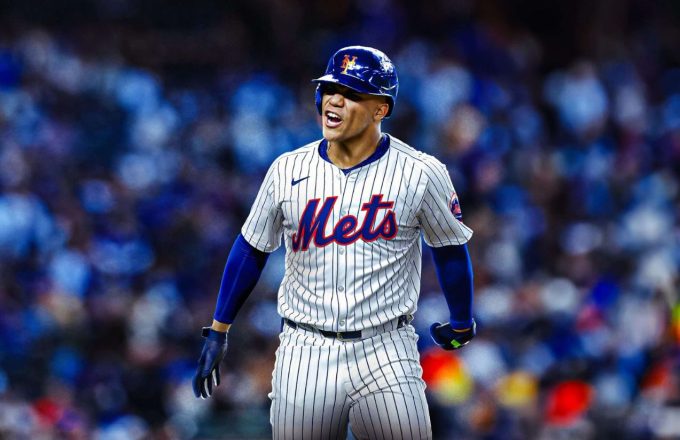 Juan Soto celebrating with his mouth open and fists stretched out after a home run