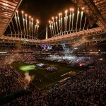The iconic stadium in the city of Miami at night, with many fireworks and a spectacular event taking place