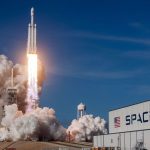 NASA and SpaceX successfully dock crew-11 to the ISS after record 15-hour flight A rocket releasing thick smoke as it launches into the vast blue sky