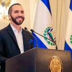 The president of El Salvador wearing a beautiful suit as he appears before his audience
