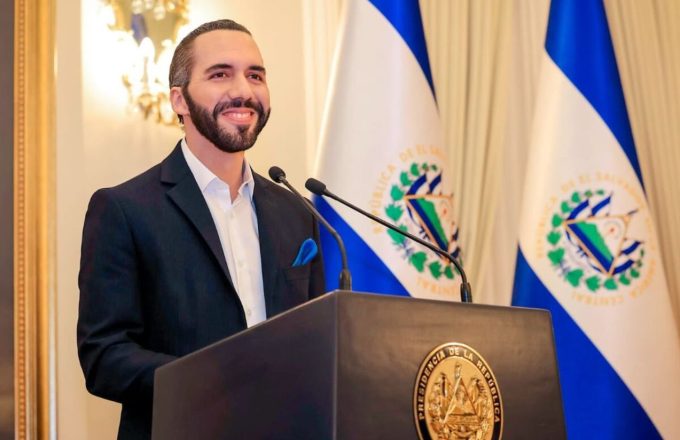 The president of El Salvador wearing a beautiful suit as he appears before his audience