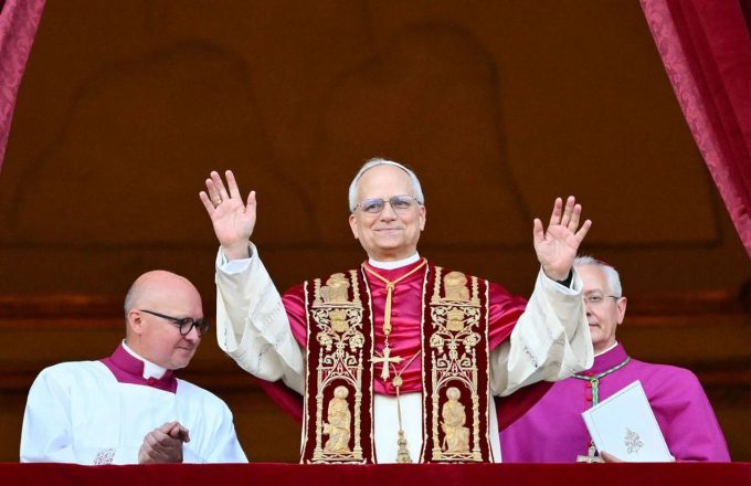 The new Pope greeting all the people from his papal balcony