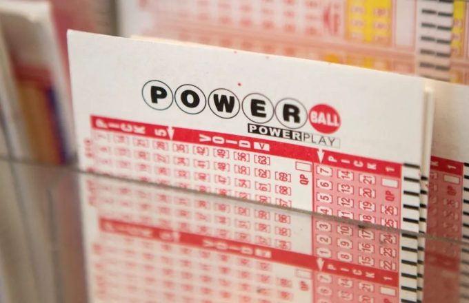 A Powerball lottery ticket with many numbers and letters