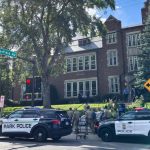 The Catholic school in Minneapolis surrounded by police cars after the tragedy