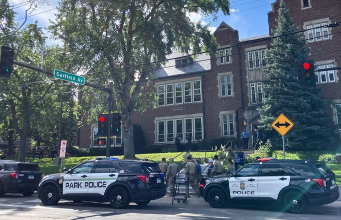 The Catholic school in Minneapolis surrounded by police cars after the tragedy