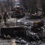 Devastation and destruction following the fires and explosions caused by the war between both nations