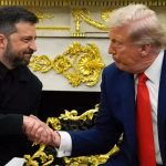 Trump and Zelenskyy sitting down and shaking hands in one of the White House offices