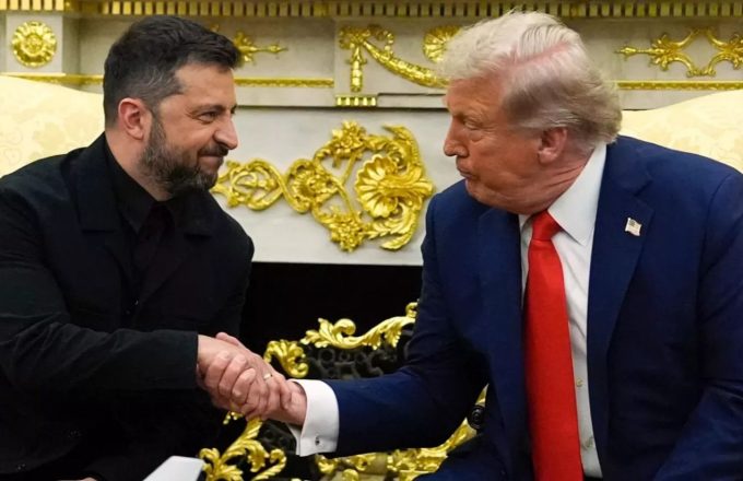 Trump and Zelenskyy sitting down and shaking hands in one of the White House offices