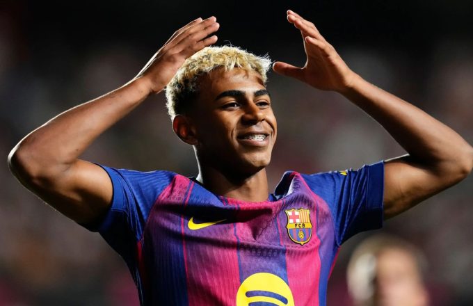 The young and talented Spanish player celebrating one of his goals while wearing the Barcelona jersey