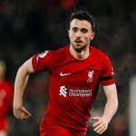 The Portuguese player running in his red uniform