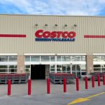 One of the Costco stores with its characteristic beige color and large red letters.