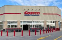 One of the Costco stores with its characteristic beige color and large red letters.