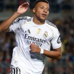 The famous French striker happily celebrating his second goal against an Afghan team in the Champions League