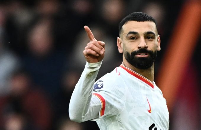 The Egyptian player pointing his finger at the crowd after scoring a goal