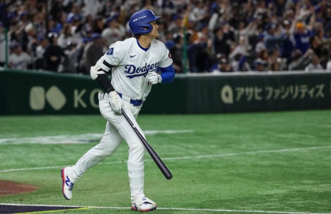 The South Korean player watching as the ball he just hit flies out of the field