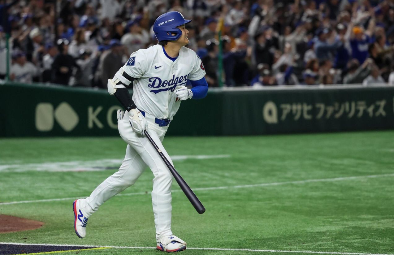 The South Korean player watching as the ball he just hit flies out of the field