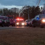 Several police cars at a crime scene in New Hampshire