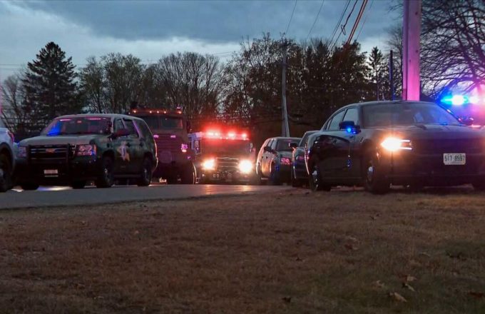 Several police cars at a crime scene in New Hampshire