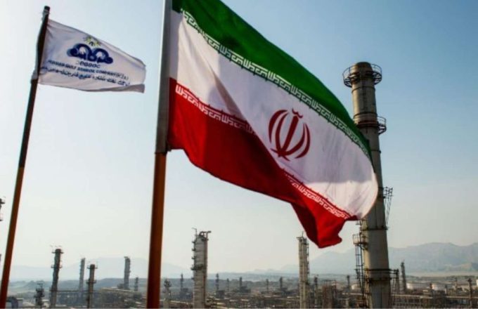 An Iranian flag with its respective green, white, and red colors