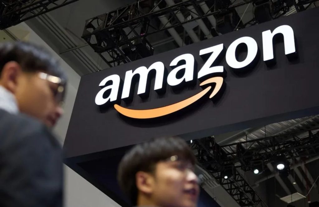 Amazon plans to replace more than half a million jobs with robots The name “Amazon” displayed at a technology exhibition