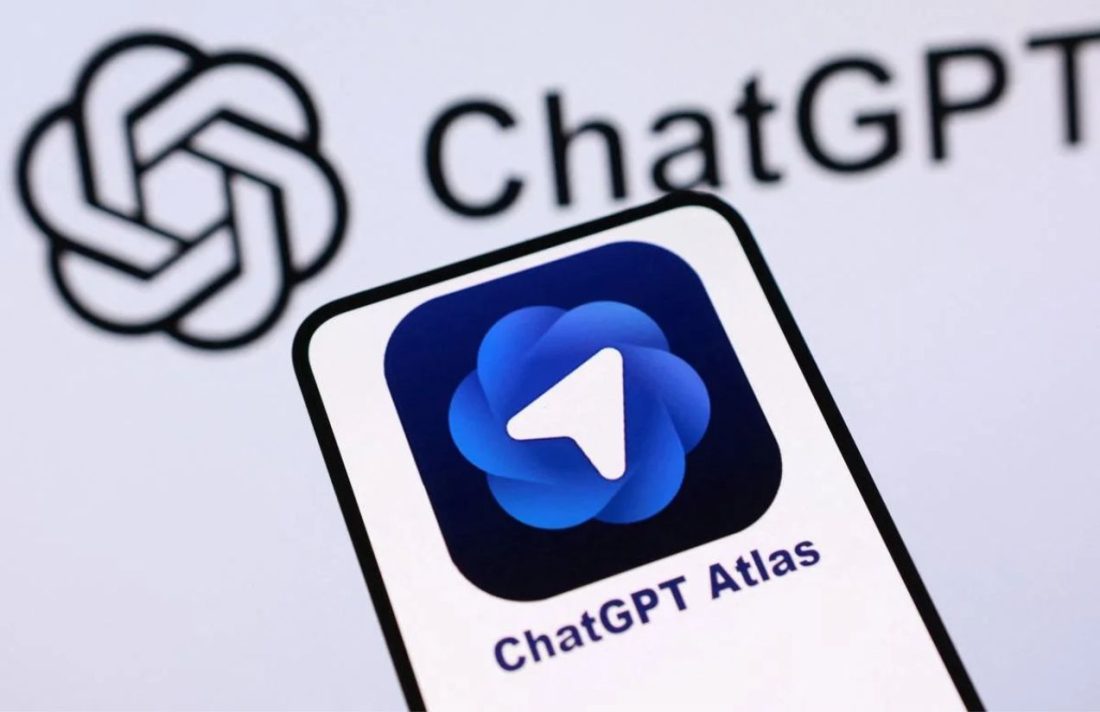 The Atlas app open on a smartphone with the word “ChatGPT” displayed in the background
