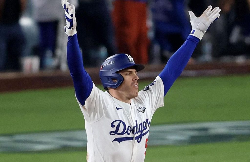 Epic 18-inning battle: Los Angeles Dodgers prevail in Game 3 of the World Series The Canadian player raising his hands after hitting a home run to win the game for his team