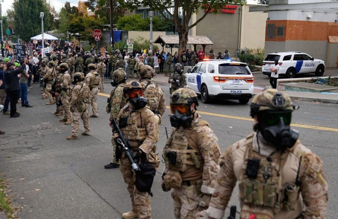 Several soldiers on the streets showing security to the residents
