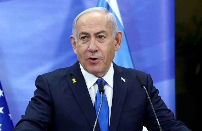 The Israeli prime minister speaking to the public from his office