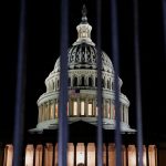 The majestic White House seen at night, illuminated by lights that make it shine and look like a wonder of the world