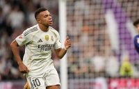 Mbappé celebrating one of his goals today