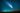 A comet leaving its glowing trail across the night sky above a city