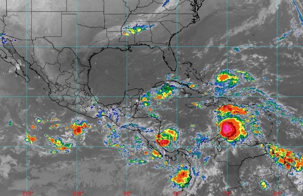 A satellite and infrared view of the storm moving across the Caribbean Sea