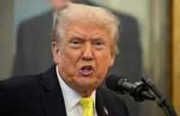 Trump claims Maduro offered “everything” to prevent an invasion of Venezuela Trump sitting at his desk surrounded by multiple microphones as he speaks to reporters