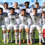 The U.S. U-20 team posing for a photo before a match