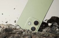 An OPPO phone upside down crashing against a rocky surface
