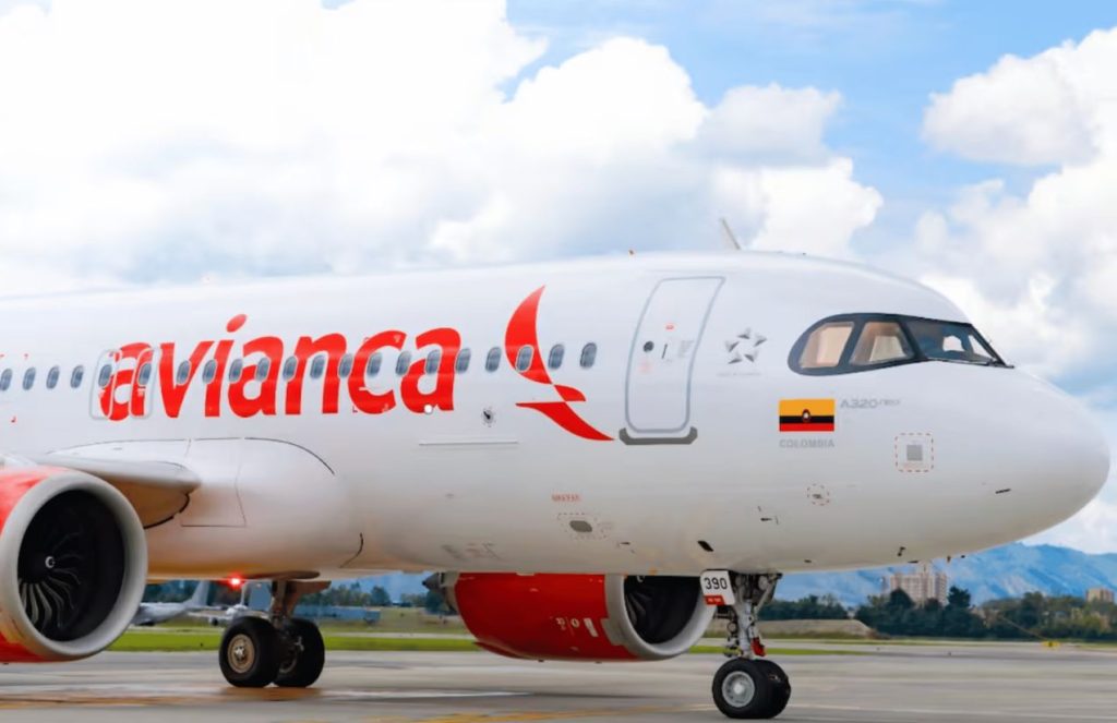 Avianca grounds more than 70% of Its fleet due to required A320 software update An Avianca airplane in its white and red colors parked at the airport waiting for passengers