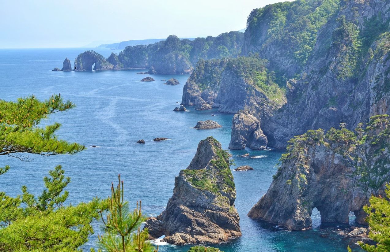 A beautiful landscape of mountains beside the sea