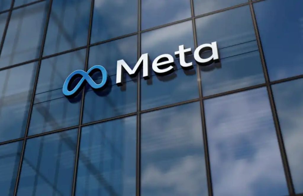 Meta will require AI proficiency to evaluate employee performance starting in 2026 A building with many glass panels featuring the word META in blue on the front