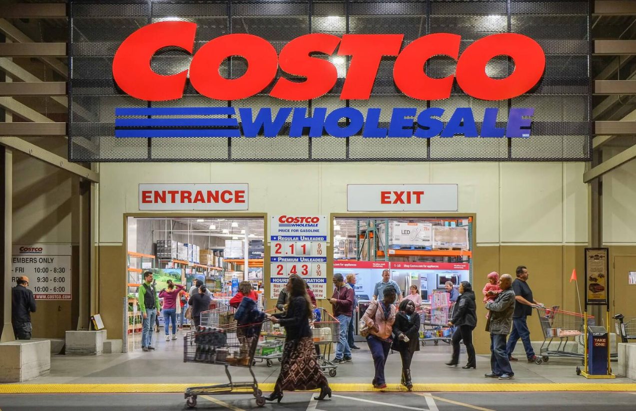 The front of a Costco store featuring its iconic red-letter logo