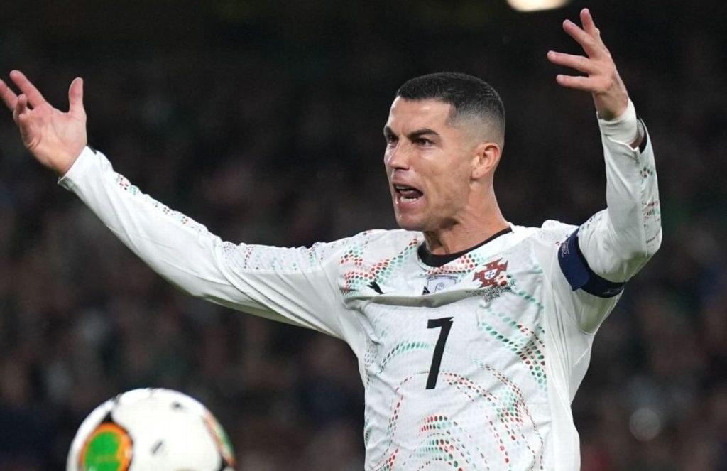 Cristiano Ronaldo with an annoyed expression, complaining about a decision that was made